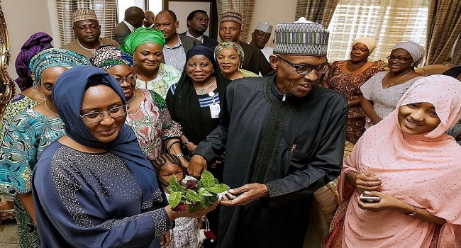 Buhari received by his wife, Aisha Buhari and well wishers