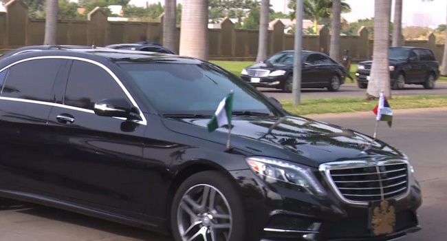 Buhari being driven to First Lady's conference Hall of the Presidential Villa