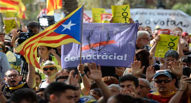 Image result for Catalonia set for general strike over independence poll violence