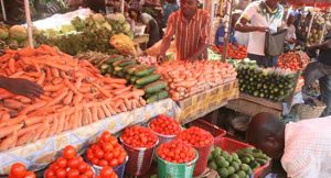 A file photo taken at a food market. A large percentage of poor Nigerians live in the rural areas where the predominant occupation is farming.