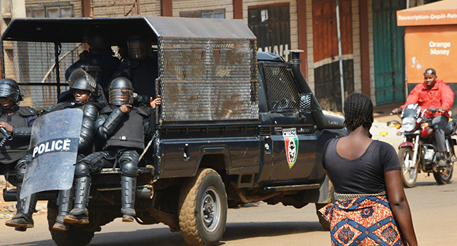 Guinean police patrol in Conakry on January 14, 2020, on the second day of open-ended protests against the president's suspected bid to prolong his rule. CELLOU BINANI / AFP