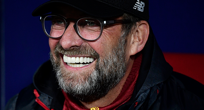 Liverpool's German manager Jurgen Klopp sits on the bench before the UEFA Champions League, round of 16, first leg football match between Club Atletico de Madrid and Liverpool FC at the Wanda Metropolitano stadium in Madrid on February 18, 2020. JAVIER SORIANO / AFP