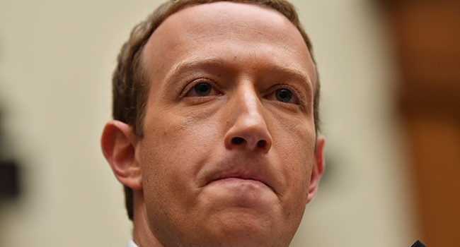 In this file photo taken on October 23, 2019 Facebook Chairman and CEO Mark Zuckerberg testifies before the House Financial Services Committee on "An Examination of Facebook and Its Impact on the Financial Services and Housing Sectors" in the Rayburn House Office Building in Washington, DC. Nicholas Kamm / AFP