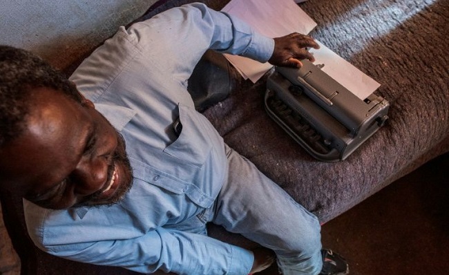 Jetro Gonese and his braille typewriter. South Africa's anti-coronavirus lockdown has had a devastating impact on the visually impaired Luca Sola AFP