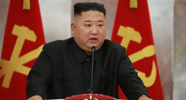 This picture taken on July 26, 2020 and released from North Korea's official Korean Central News Agency (KCNA) on July 27 shows North Korean leader Kim Jong Un speaking at a ceremony to confer "Paektusan" commemorative pistols on leading commanding officers of DPRK armed forces on the occasion of the 67th anniversary of the Korean War ceasefire in Pyongyang. STR / KCNA VIA KNS / AFP