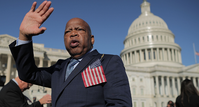  In this file photo taken on October 03, 2017 Rep. John Lewis (D-GA) thanks anti-gun violence supporters following a rally with fellow Democrats on the East Front steps of the U.S. House of Representatives October 4, 2017 in Washington, DC. CHIP SOMODEVILLA / GETTY IMAGES NORTH AMERICA / AFP