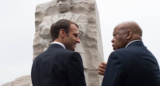  In this file photo taken on April 25, 2018 France's President Emmanuel Macron stands with US Rep. John Lewis(D-GA) in front of the Martin Luther King,Jr. Memorial in Washington, DC. Eric BARADAT / AFP