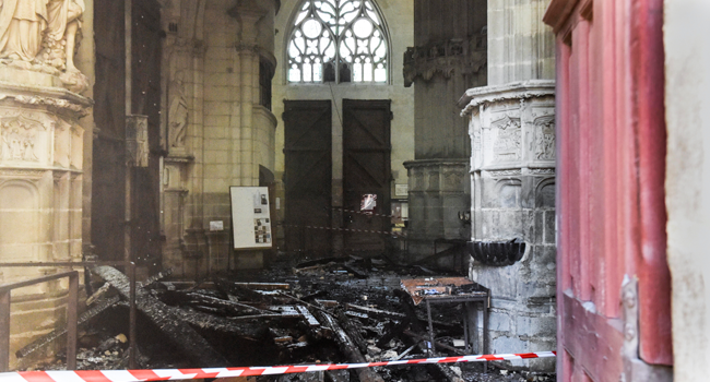 This photograph taken on July 18, 2020, shows the damage inside the Saint-Pierre-et-Saint-Paul cathedral in Nantes, western France. Sebastien SALOM-GOMIS / AFP