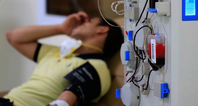 An Egyptian man who recovered from Covid-19 donates blood at the National Blood Transfusion centre in Cairo on July 22, 2020. Khaled DESOUKI / AFP