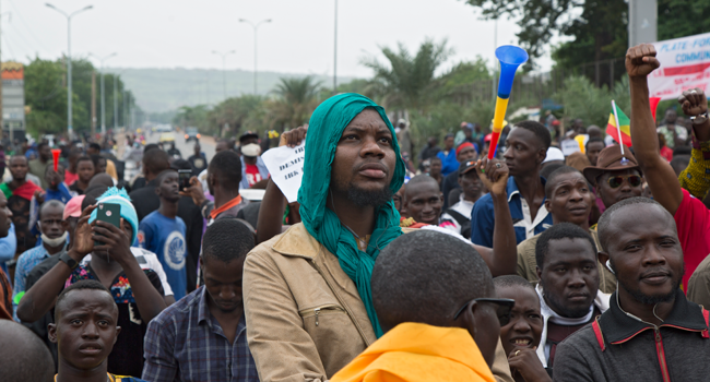 A man looks on during a protest organised by M5-RFP, who are calling for Malian President Ibrahim Boubacar Keita to resign, in Bamako on August 11, 2020. ANNIE RISEMBERG / AFP