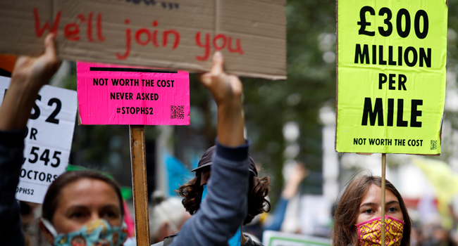 Activists take part in demonstration against the HS2 hi-speed rail line outside the Department of Transport, as part of protests by the Extinction Rebellion climate change group in central London on September 4, 2020 on the fourth day of their new series of 'mass rebellions'. Tolga Akmen / AFP