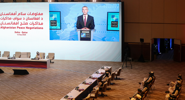 NATO Secretary General Jens Stoltenberg delivers a speech, via video call, during the opening session of the peace talks between the Afghan government and the Taliban in the Qatari capital Doha on September 12, 2020. KARIM JAAFAR / AFP