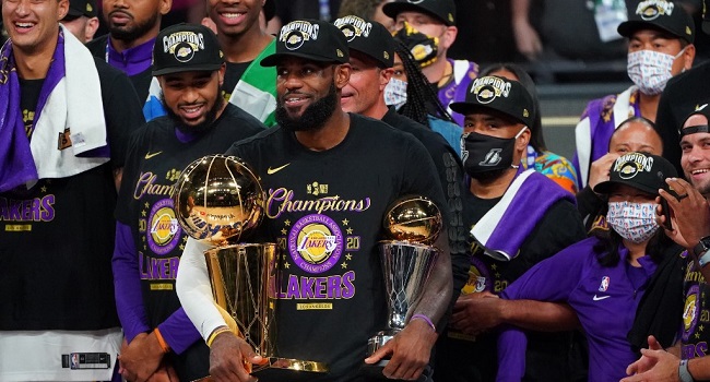 LeBron James of the Los Angeles Lakers celebrates with the Larry