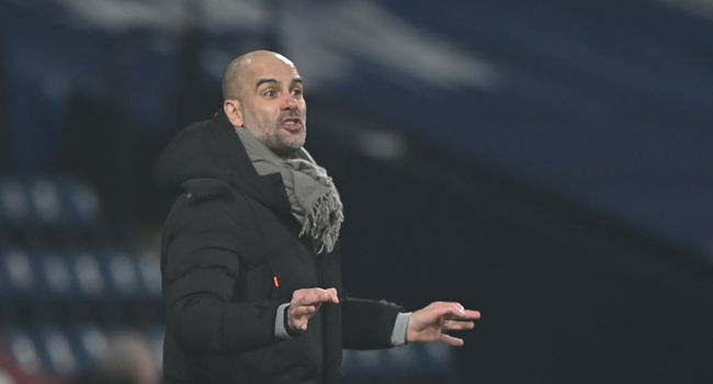 Manchester City's Spanish manager Pep Guardiola gestures during the English Premier League football match between West Bromwich Albion and Manchester City at The Hawthorns stadium in West Bromwich, central England, on January 26, 2021. Laurence Griffiths / POOL / AFP