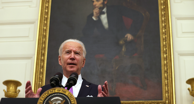 U.S. President Joe Biden speaks during an event at the State Dining Room of the White House January 21, 2021 in Washington, DC. Alex Wong/Getty Images/AFP