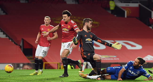 Everton's English striker Dominic Calvert-Lewin scores his team's third goal during the English Premier League football match between Manchester United and Everton at Old Trafford in Manchester, north west England, on February 6, 2021. Michael Regan / POOL / AFP