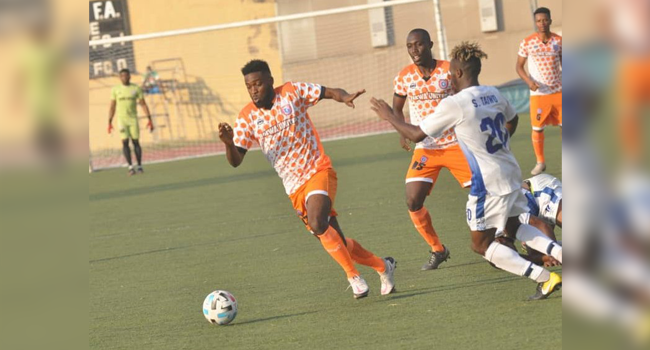 Goalscorer Charles Atshimene of Akwa United on the ball.