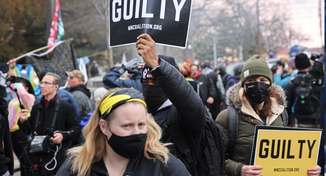  People react after the verdict was read in the Derek Chauvin trial on April 20, 2021 In Minneapolis, Minnesota. Scott Olson/Getty Images/AFP