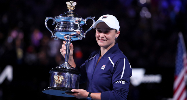 Australia's Ashleigh Barty holds her trophy following her victory in the women's singles final match against Danielle Collins of the US on day thirteen of the Australian Open tennis tournament in Melbourne on January 29, 2022. Aaron FRANCIS / AFP