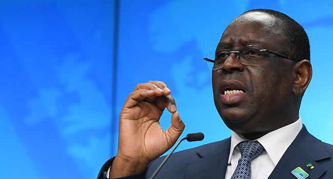 Senegal's President Macky Sall gives a press conference on the second day of a European Union (EU) African Union (AU) summit at The European Council Building in Brussels on February 18, 2022. JOHN THYS / POOL / AFP