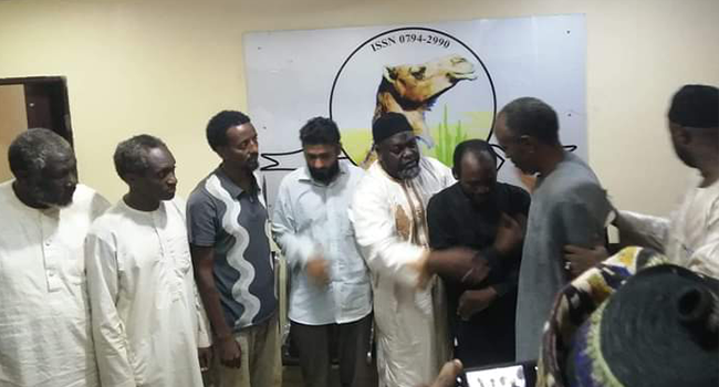 Some of the victims and Tukur Mamu (fourth from right) after their release.