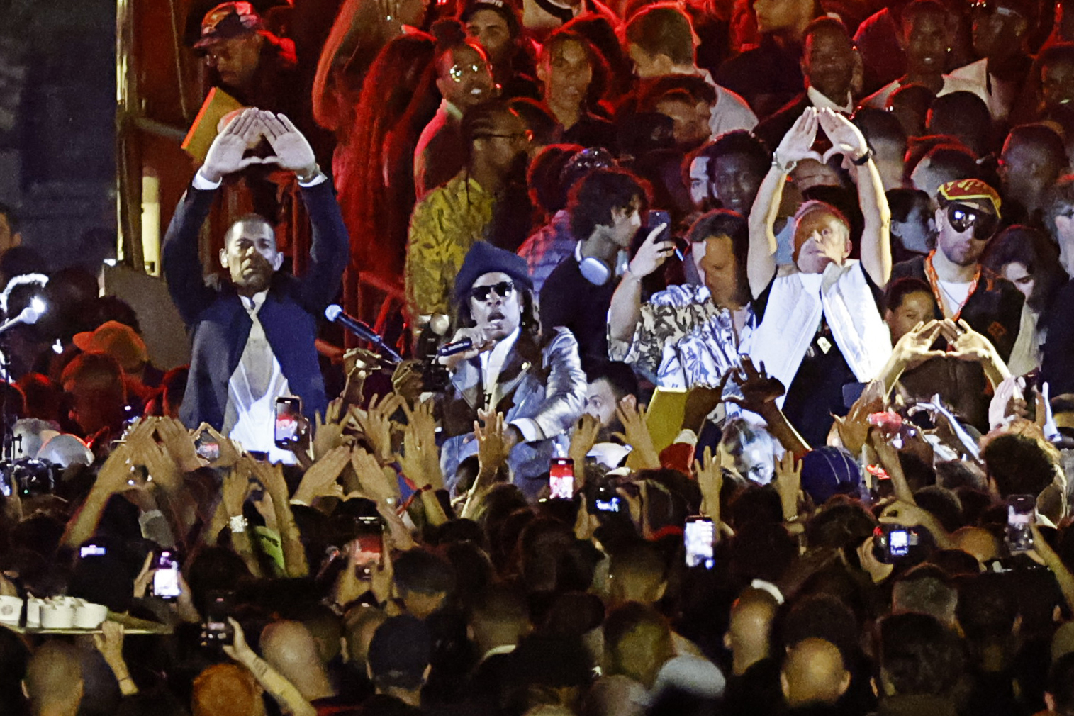 Louis Vuitton' fashion designer, singer Pharrell Williams, acknowledges the  audience at the end of the Louis Vuitton menswear spring/summer 2024 show  as part of Paris Fashion Week on the Pont Neuf, central